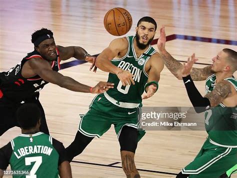 Pascal Siakam Of The Toronto Raptors And Jayson Tatum Of The Boston