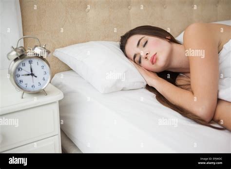 Pretty Brunette Sleeping In Bed Stock Photo Alamy
