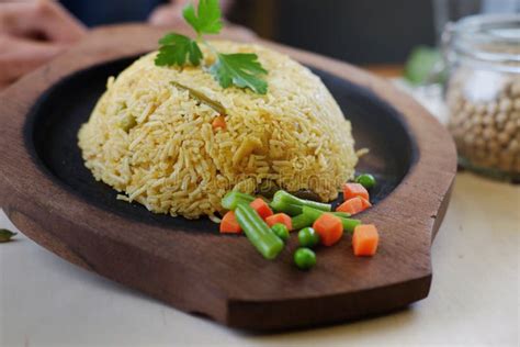 Traditional Indian Curry Rice With Parsley Leaf And Vegetables On Wooden Plate Stock Image ...