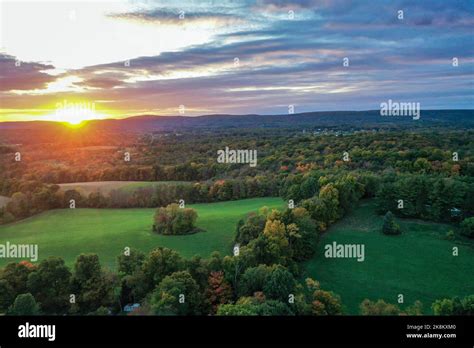 Brilliant Sunset In Early Fall Over Sussex County Nj With Large Fields And Foliage Aerial Stock