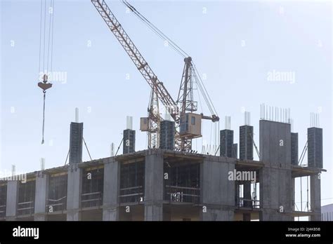 A Crane In Construction Work A Concrete Of High Rise Building Under