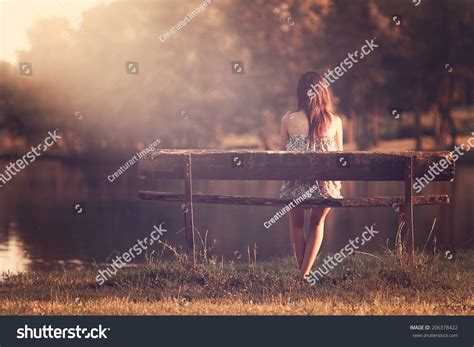 Girl Sitting On Bench Stock Photo (Edit Now) 206378422