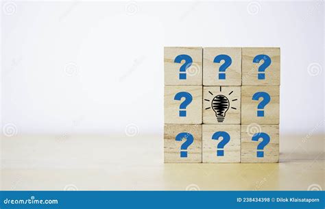 Drawing Lightbulb Print Screen On Wooden Cube Block Among Question Mark