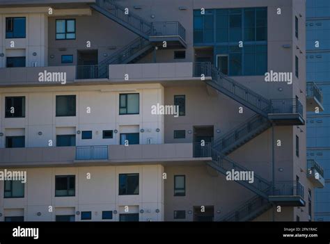 Residential Condominiums Complex Facade With Symmetrical Grey Concrete