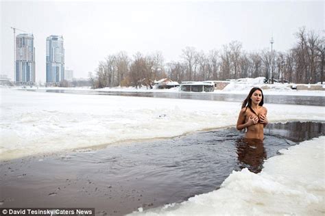 Ukrainian Woman Jogs Naked In The Snow And Skinny Dips Daily Mail Online