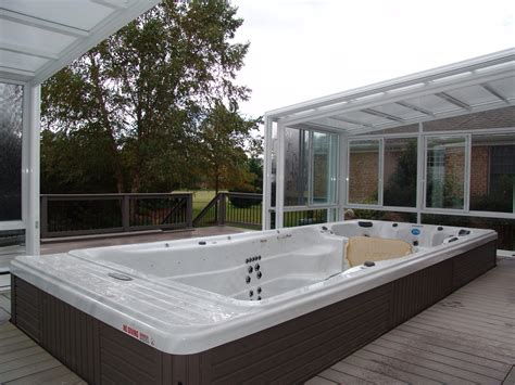 Year Round Indoor Outdoor Hot Tub Rooms Designed By Roll A Cover Hot