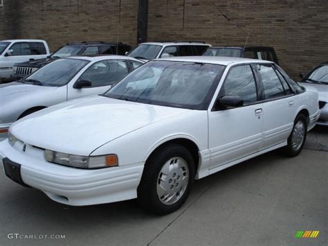 Bright White Oldsmobile Cutlass Supreme Sl Sedan Photo