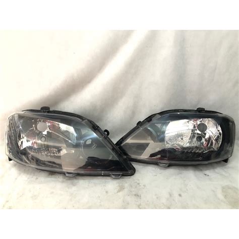 Par Farol Renault Logan 2011 á 2013 Máscara Negra Original Shopee Brasil