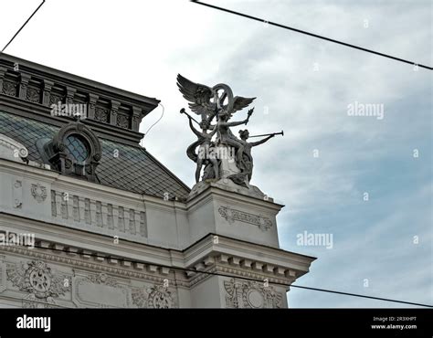 Group Of Figures On The Roof Of The Historic Building Of The Main