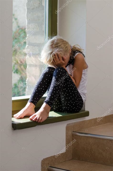 Crying child sitting alone Stock Photo by ©KatarinaGondova 86022228