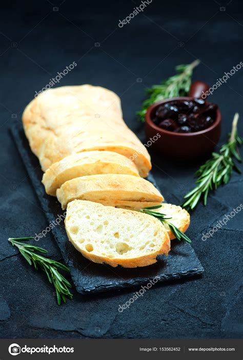 Fresh bread with olives — Stock Photo © tycoon #153562452