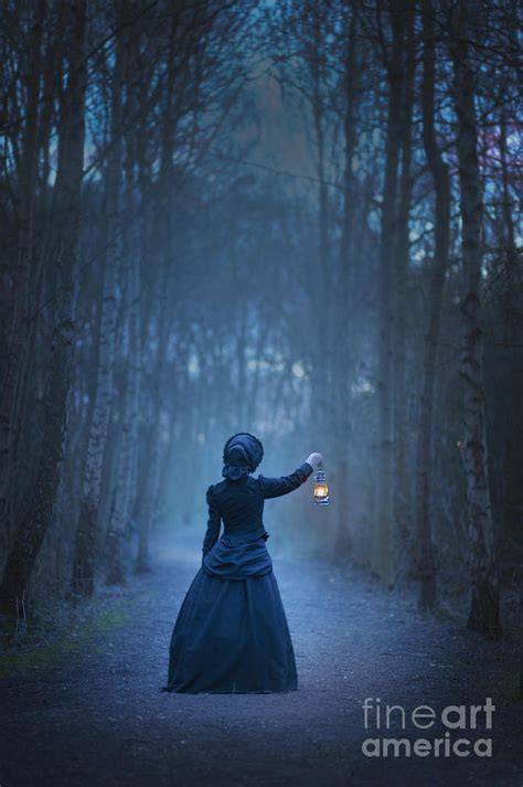 Victorian Or Edwardian Woman Holding An Oil Lamp At Night Photograph By