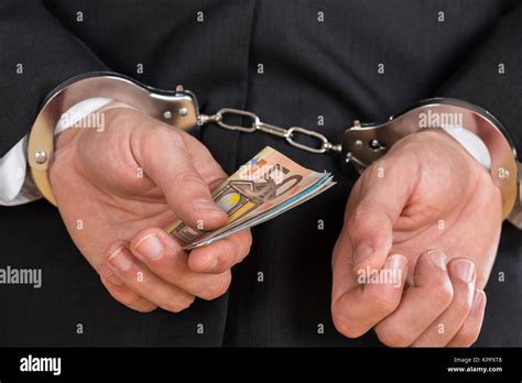 Thief Arrested Handcuffs Hi Res Stock Photography And Images Alamy