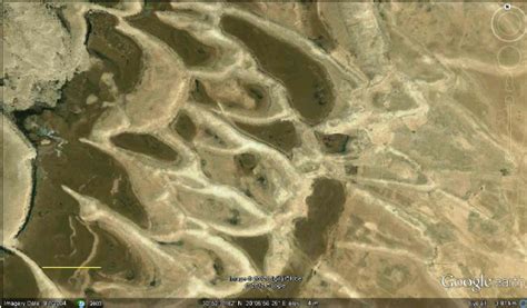 Large parabolic dunes developed on the coastal plain of Libya. Scale ...