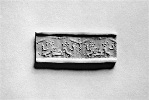 Cylinder Seal With A Winged Genius And Animals 42671 The Walters