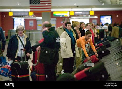 Arriving Passengers Wait For Their Luggage At Terminal 4 Of Jfk Airport In New York City Usa