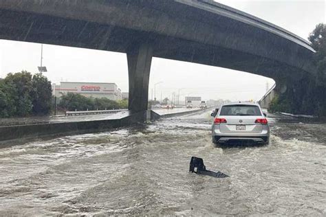 Storm Brings Flooding Landslides Across California