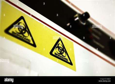 Biohazard warning sign Stock Photo - Alamy