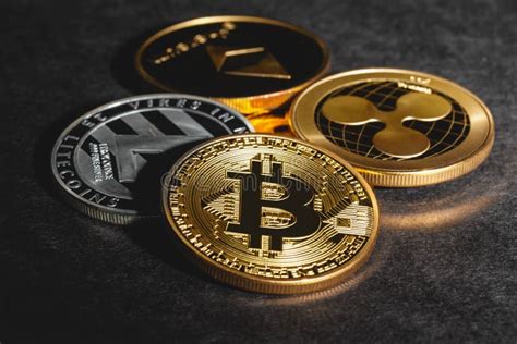 Bitcoin Litecoin Ripple And Ethereum Coins Editorial Photography