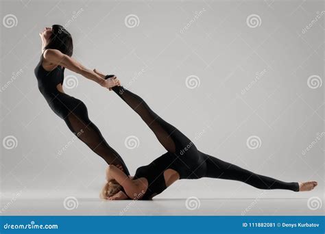 Acrobatic Couple Stock Photos - Royalty Free Images