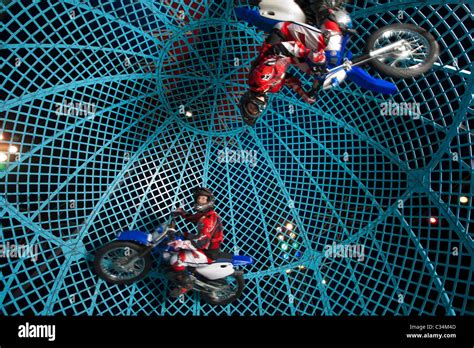 motorcycle stunt circus high resolution stock photography  images