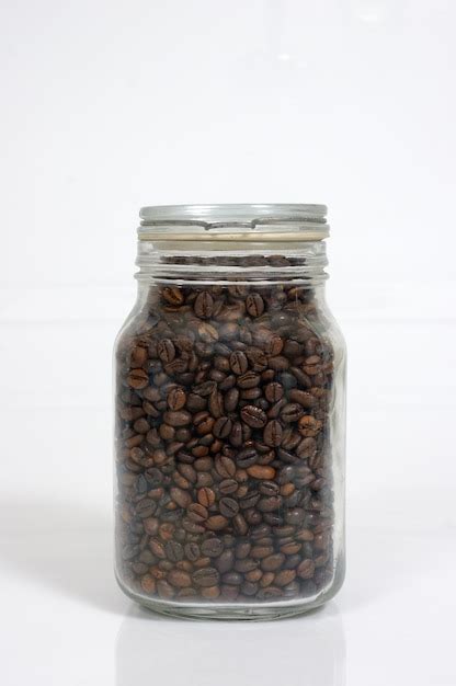 Premium Photo Coffee Bean Inside Glass Jar