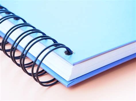 Premium Photo | Blue spiral notebook closeup