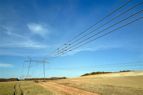 Premium Photo High Voltage Tower With Electric Power Lines