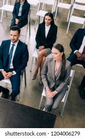 High Angle View Multiracial Businesspeople Listening Stock Photo