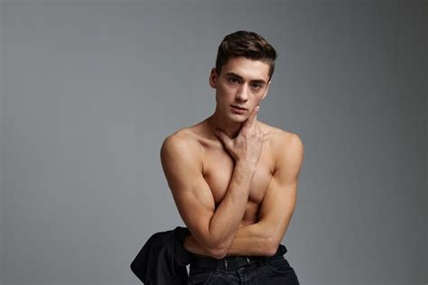 Premium Photo Cute Man Black Jacket Nude Torso Posing Self Confidence Model