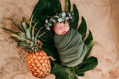 Hawaiian Baby Girl Newborn Photography On The Beach With A Haku