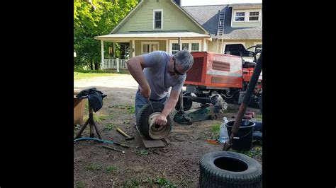 Struggling As I Change A Kubota F2400 Lawnmower Tire With Slide Hammer