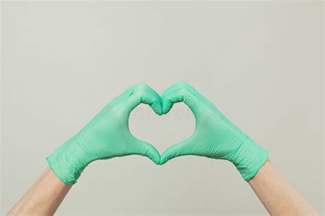 Hands in Green Doctor Gloves Making Heart on Gray Background Stock Image - Image of love, hands ...