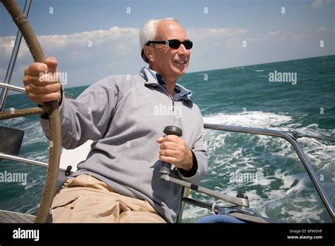 Mature Man Sailing Yacht Stock Photo Alamy