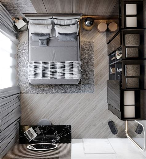 An Aerial View Of A Bedroom With A Bed Desk And Bookcase In It