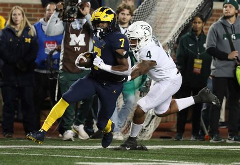 Michigan, Michigan State football 2023 season predictions: Record ...