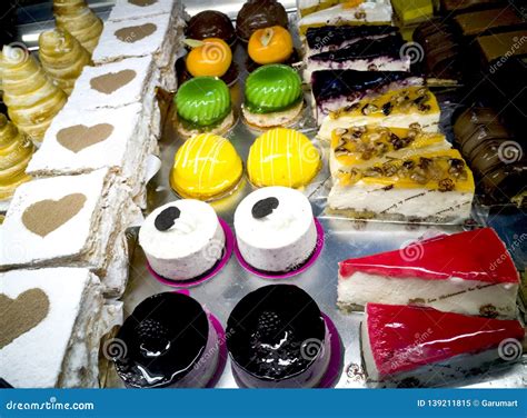 Cakes In The Bakery Display Stock Image - Image of sweets, tasty: 139211815