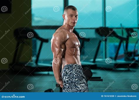 Fitness Shaped Muscle Man Posing In Dark Gym Stock Photo Image Of