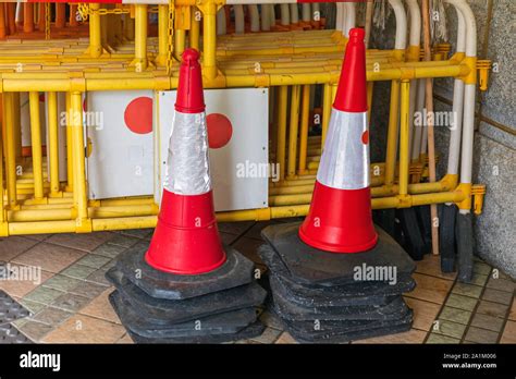 Stacked Traffic Cones And Construction Barriers Barricades Stock Photo