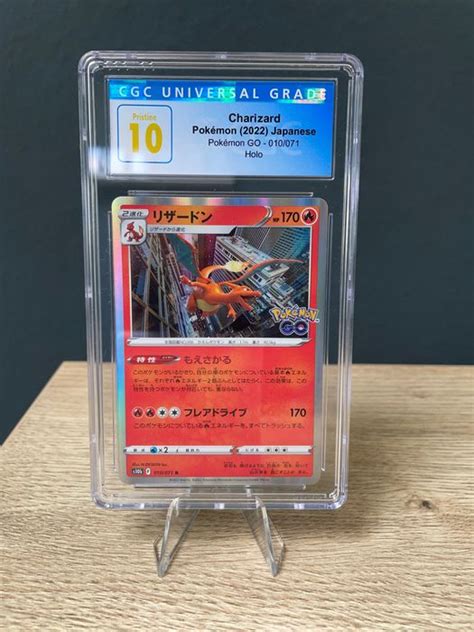 The Pok Mon Company Graded Card Cgc Pristine Charizard Catawiki