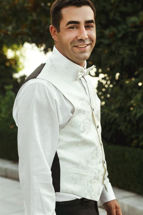 Handsome Strong Groom Holding Beautiful Sexual Brunette Bride In Stock Photo Image Of Adult