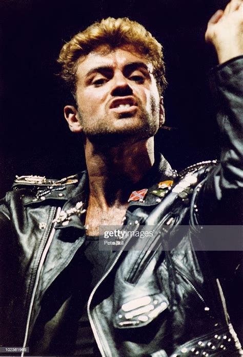 George Michael Performs On Stage On His Faith Tour At Earls Court