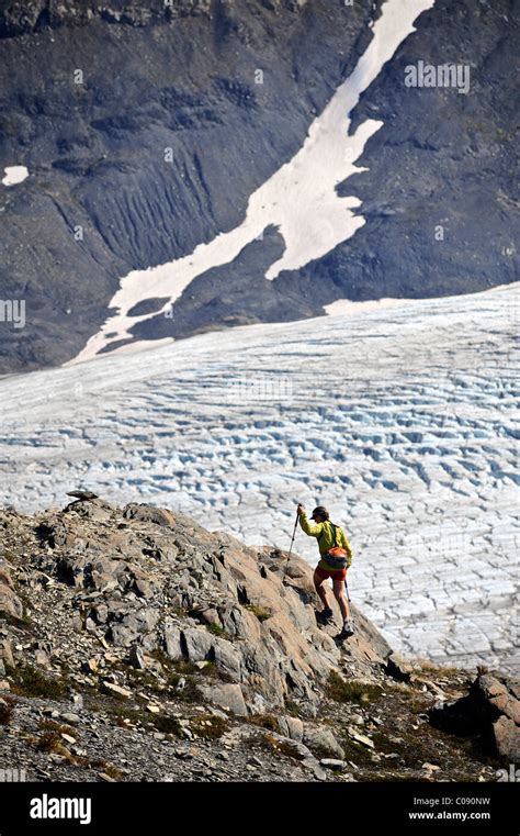 Woman Hiking Exit Glacier In The Harding Icefield Kenai Fjords