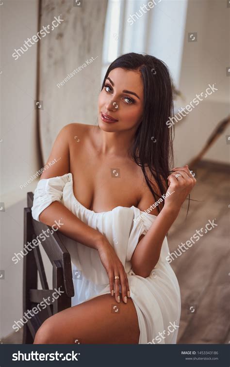 Sexy Brunette White Dress Sitting By Stock Photo 1453343186 Shutterstock