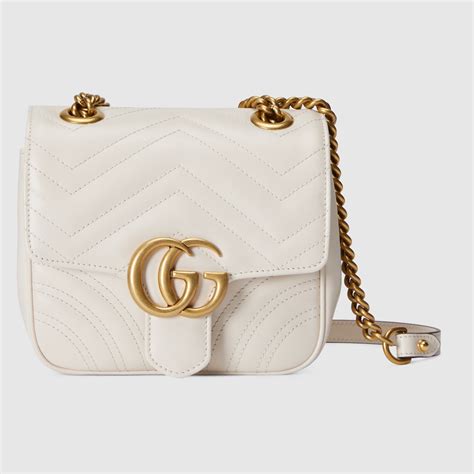 GG Marmont Mini Schultertasche in weißes Leder GUCCI DE