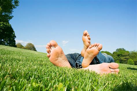 100+ Barefoot Couple Human Foot Grass Stock Photos, Pictures & Royalty ...