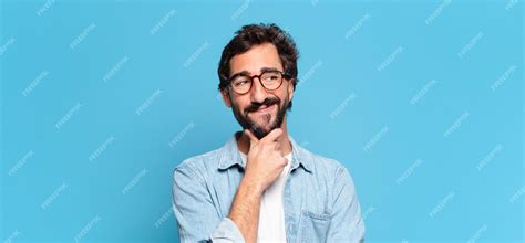 Premium Photo Young Crazy Bearded Man Thinking Or Doubting Expression