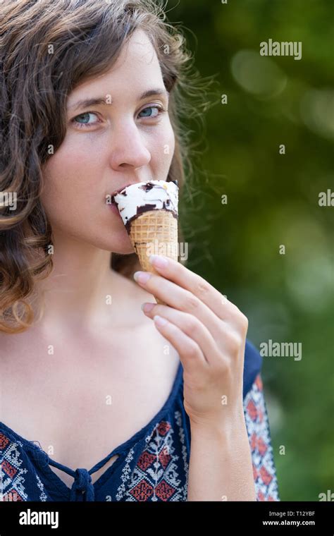 Woman Eating One Vanilla Chocolate Ice Cream Gelato Cone With