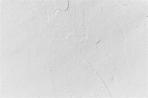 Pared o textura de yeso gris o blanco que se utilizará como fondo