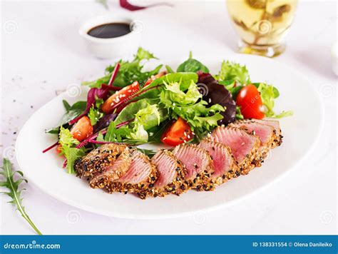 Japanese Traditional Salad With Pieces Of Medium Rare Grilled Ahi Tuna